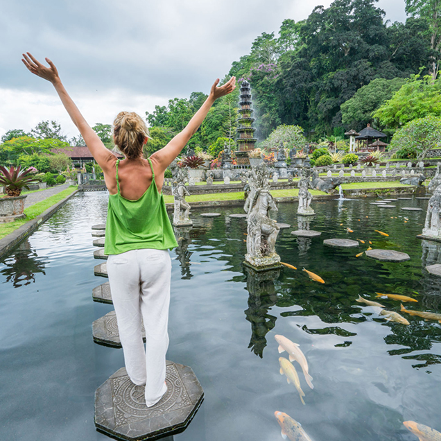 woman-at-water-temple-in-bali-indonesia-636×636