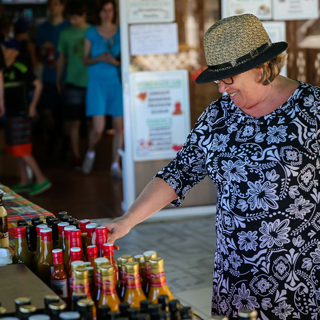 woman-shopping-at-a-market-in-saint-lucia-636×636